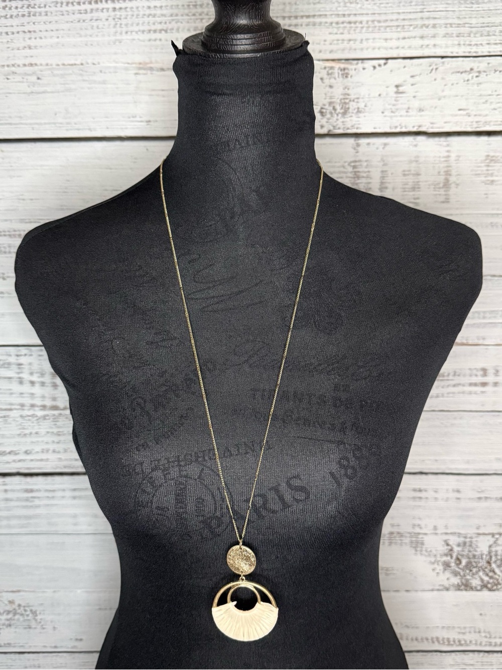 Long pendant necklace antique gold tone
with cream weaving  from pulse boutique